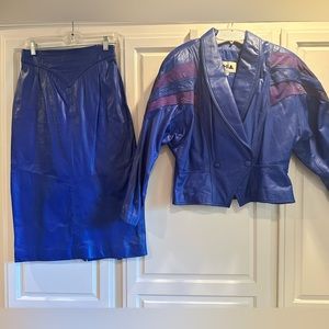 Vintage blue leather skirt set. Jacket has leather & suede design on shoulders.